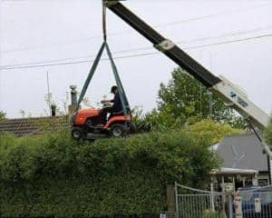 man-mowing-his-bushes-funny-pictures1